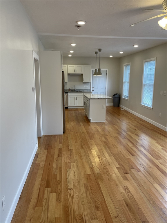 79 Newton Street, Unit 79 Somerville, MA 02143 - Photo 18 of 24 a view of kitchen view with wooden floor