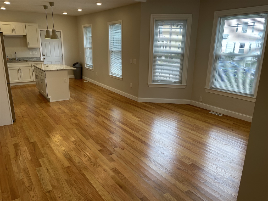 79 Newton Street, Unit 79 Somerville, MA 02143 - Photo 19 of 24 a view of kitchen with breakfast area and window