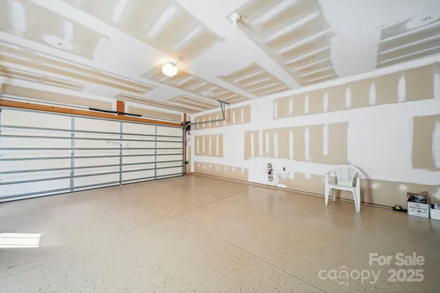a view of a room with lots of white furniture