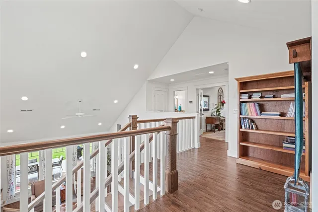 a view of front door with wooden floor