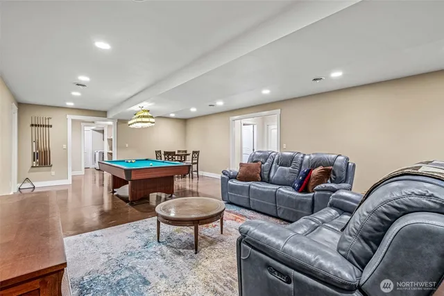 a living room with furniture and a table
