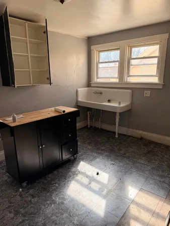 a room with furniture and a window