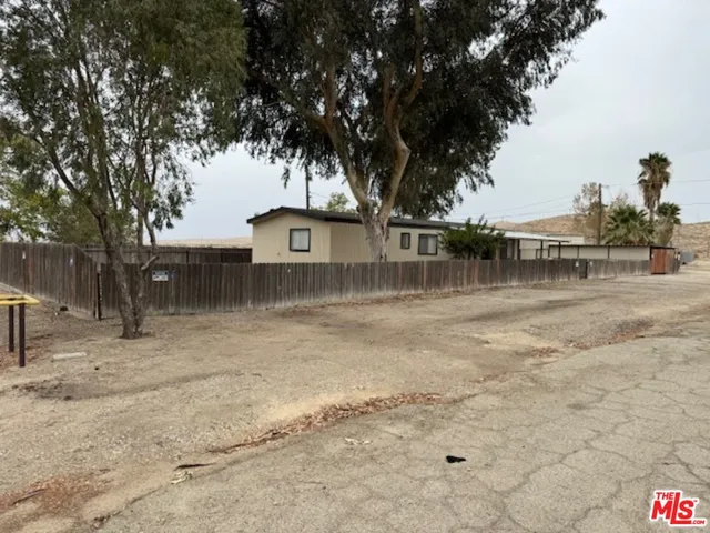 a view of a lake with a tree