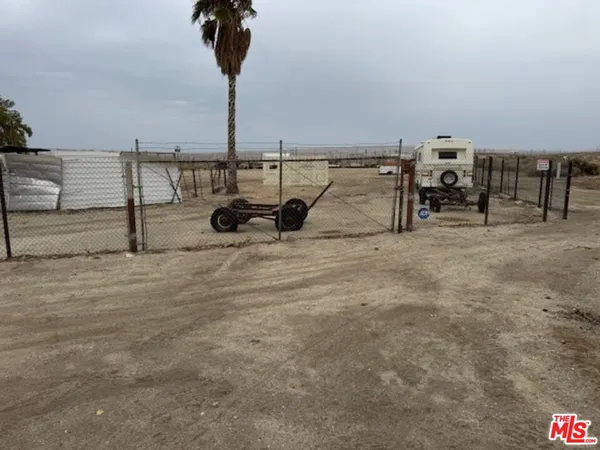 a view of a terrace with chairs