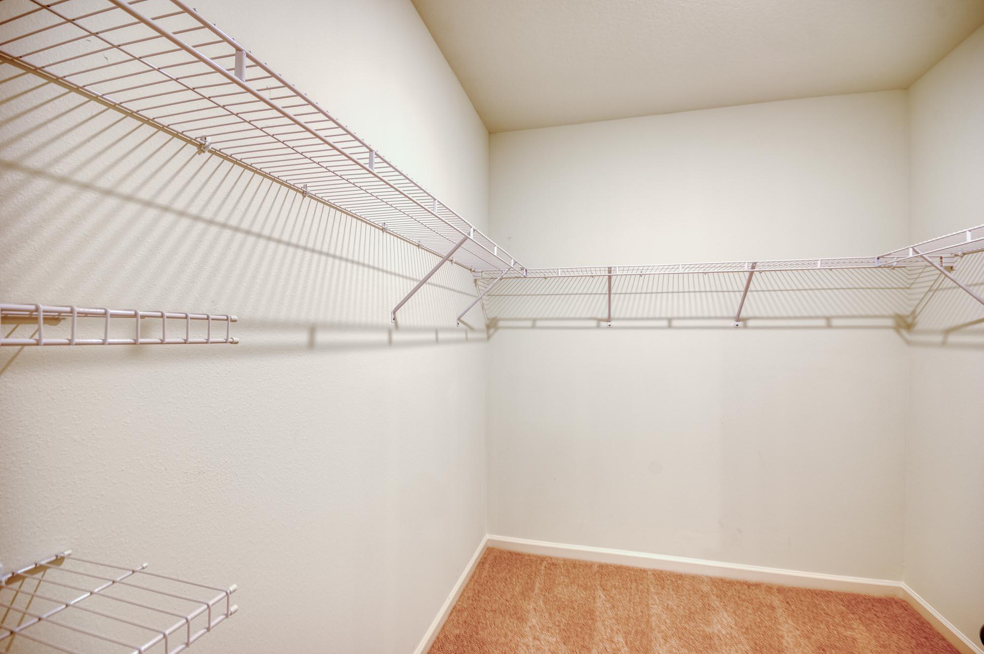 9767 Southwest Triton Way Port Port St. Lucie, FL 34987 - Photo 20 of 52 a view of a room with racks on the wall