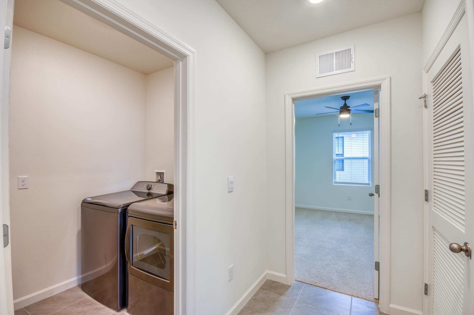 9767 Southwest Triton Way Port Port St. Lucie, FL 34987 - Photo 30 of 52 a view of a hallway with closet