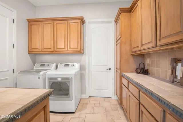 a bed room with bed and a large window