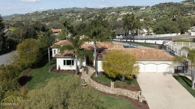 a view of a chairs and table on the wooden floor