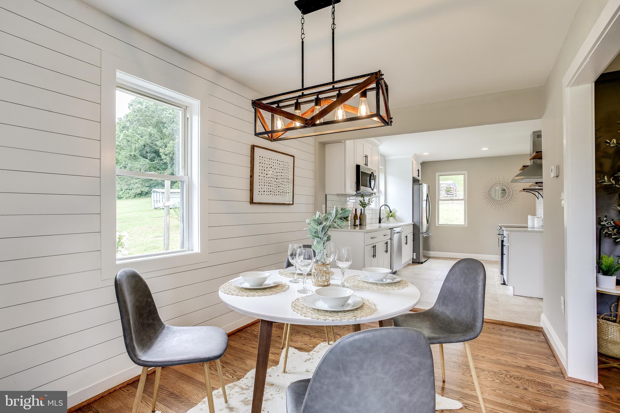 1526 Ridge Road Whiteford, MD 21160 - Photo 7 of 32 Dining Room with Shiplap Walls