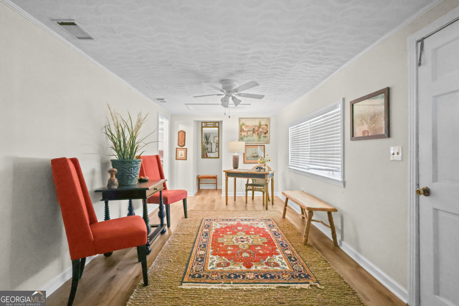 780 David Carter Road Baxley, GA 31513 - Photo 16 of 35 a view of a livingroom with furniture window and wooden floor