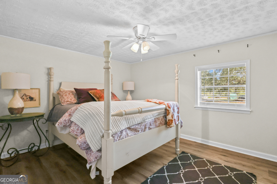 780 David Carter Road Baxley, GA 31513 - Photo 18 of 35 a bedroom with a bed and a window