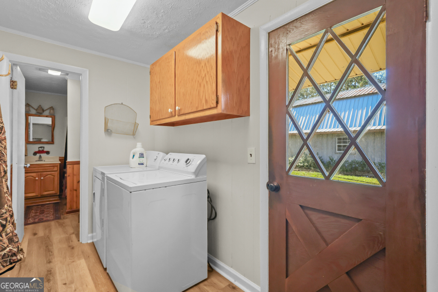 780 David Carter Road Baxley, GA 31513 - Photo 26 of 35 a utility room with dryer and washer