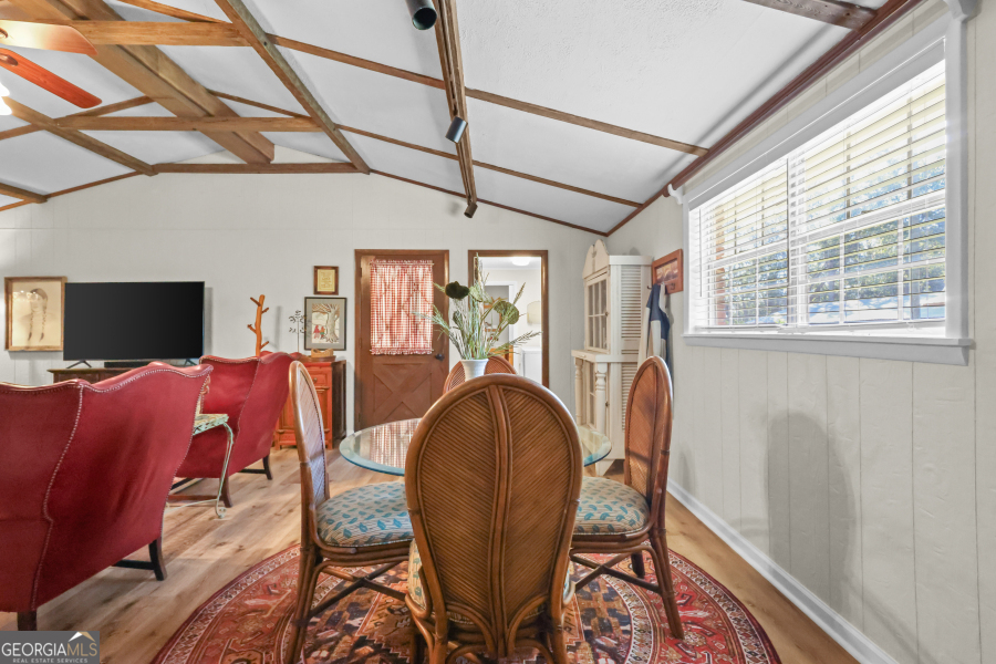 780 David Carter Road Baxley, GA 31513 - Photo 9 of 35 a living room with furniture and a flat screen tv