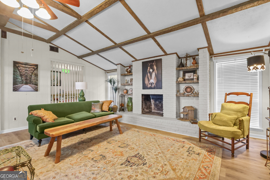 780 David Carter Road Baxley, GA 31513 - Photo 10 of 35 a living room with furniture and a fireplace