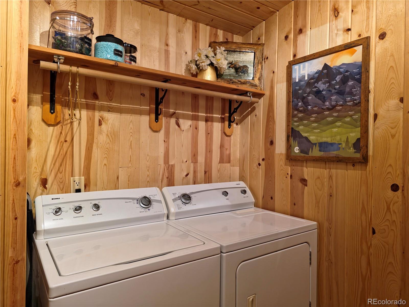 891 South Mountain Estates Road Florissant, CO 80816 - Photo 19 of 43 a utility room with dryer and washer