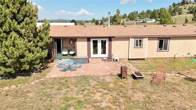 a view of a yard with an outdoor space