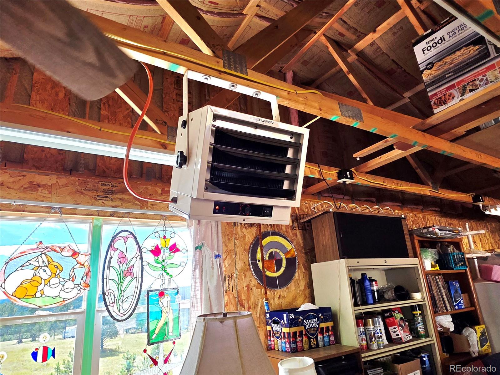 891 South Mountain Estates Road Florissant, CO 80816 - Photo 40 of 43 a view of storage and utility room