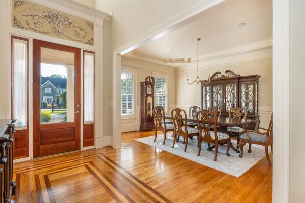 a living room with furniture and windows