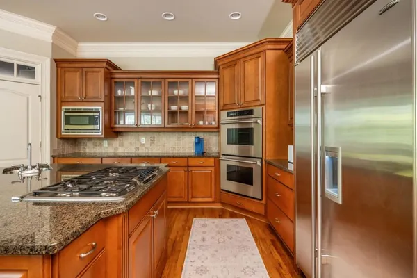 a bedroom with a bed and a view of bedroom