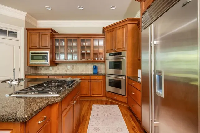 a bedroom with a bed and a view of bedroom