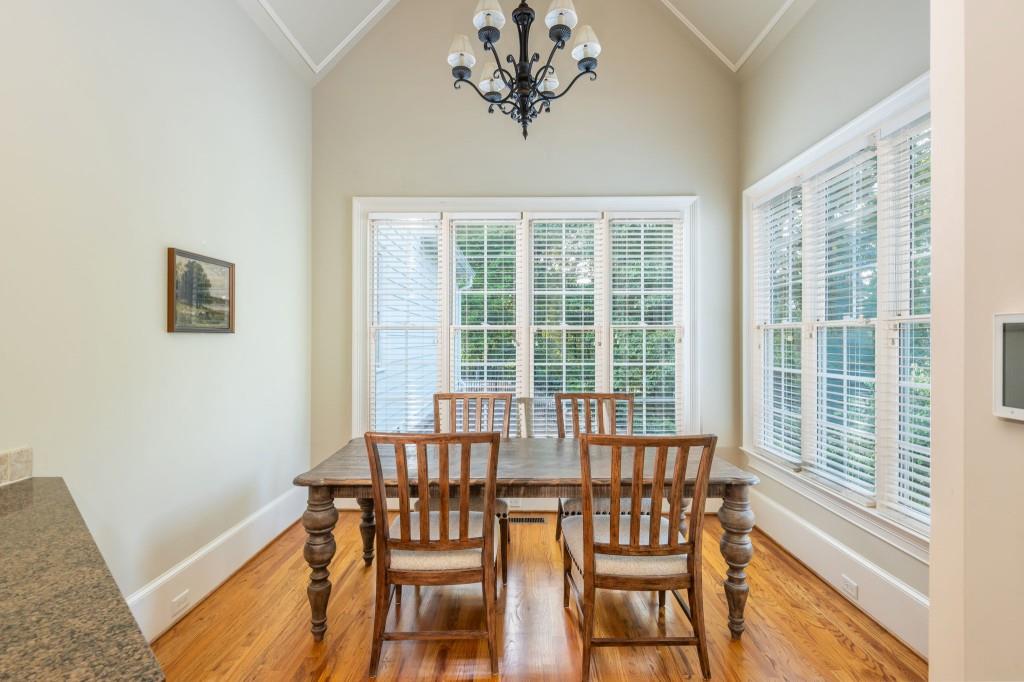 220 Edwards Brook Court Canton, GA 30115 - Photo 31 of 77 a view of a dining room with furniture window and outside view