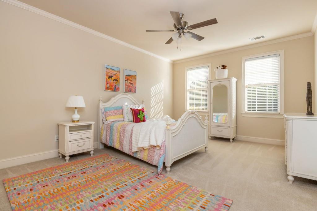 220 Edwards Brook Court Canton, GA 30115 - Photo 42 of 77 a bedroom with a bed and a view of bedroom