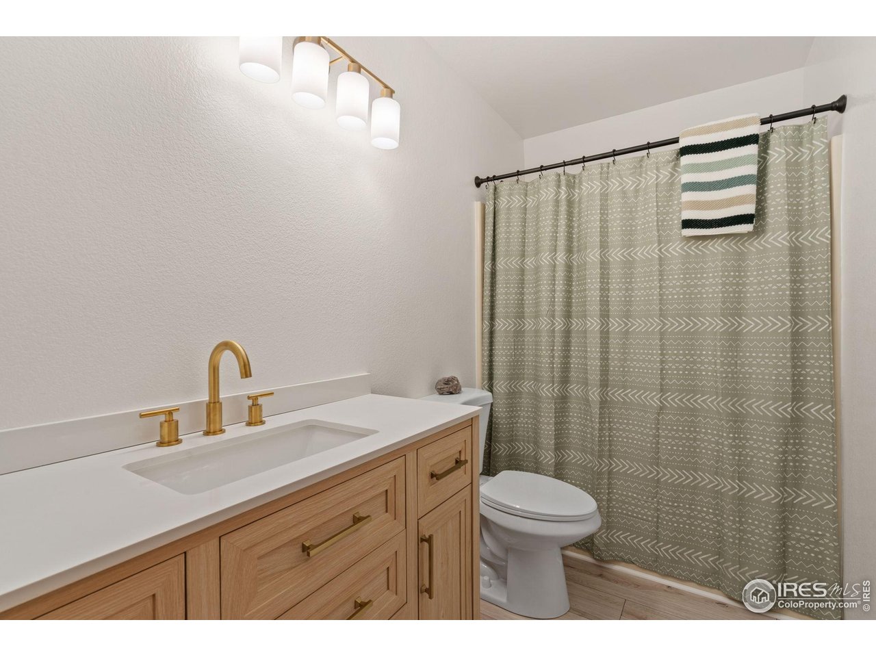 1255 Alameda Street Fort Collins, CO 80521 - Photo 16 of 22 Secondary Bathroom. Mirror coming soon.