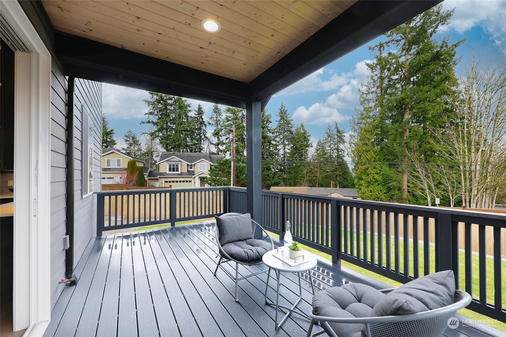2 213th Street Southwest Bothell, WA 98021 - Photo 38 of 40 a view of a two chairs in the deck