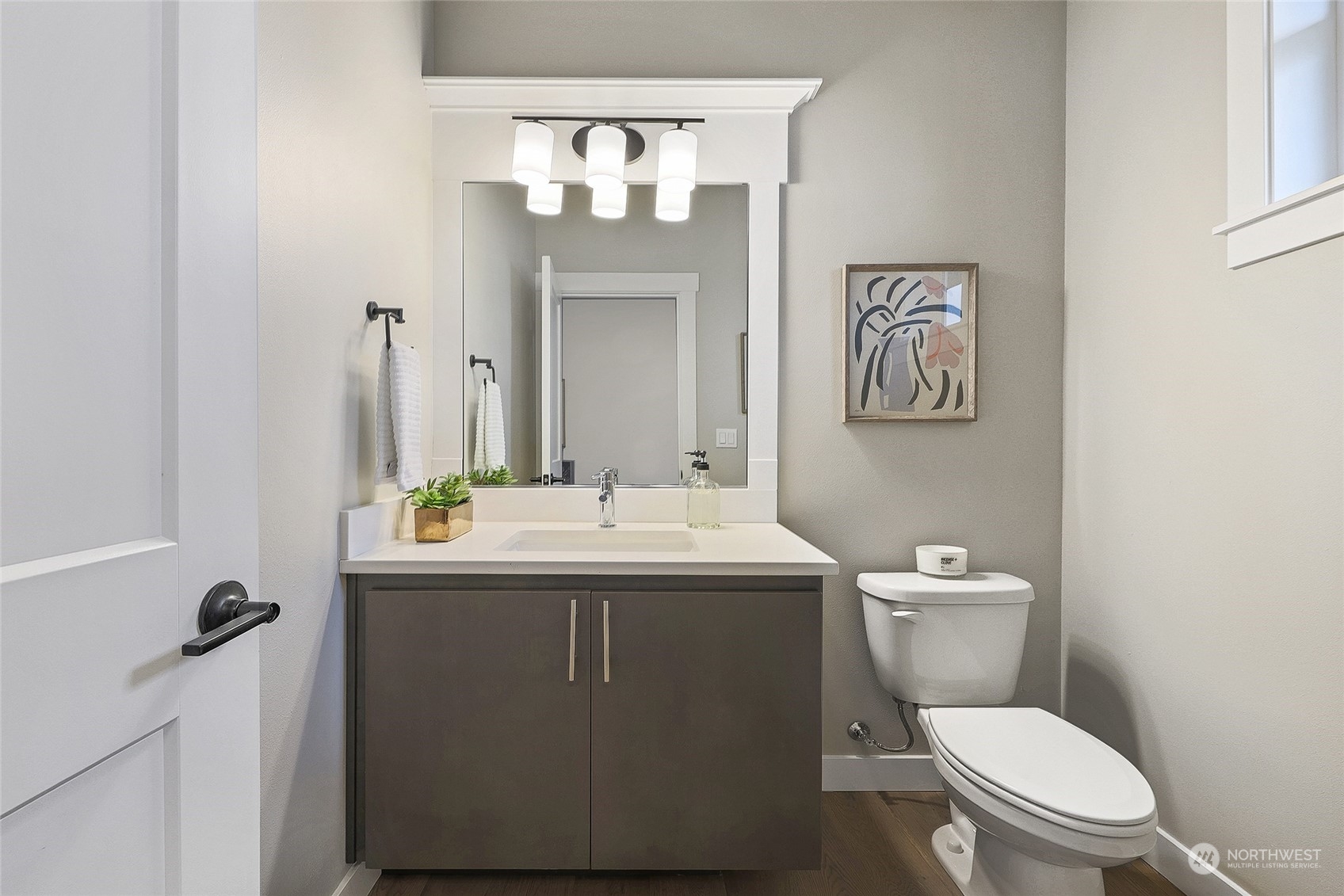 2 213th Street Southwest Bothell, WA 98021 - Photo 6 of 40 a bathroom with a toilet sink and mirror