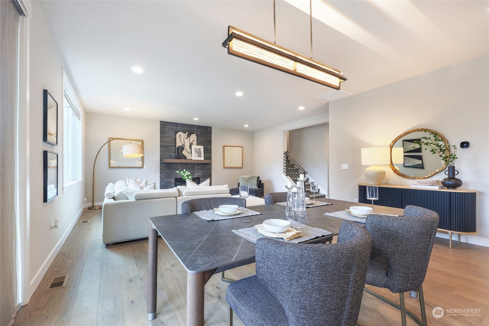 2 213th Street Southwest Bothell, WA 98021 - Photo 10 of 40 a view of a dining room with furniture and a chandelier