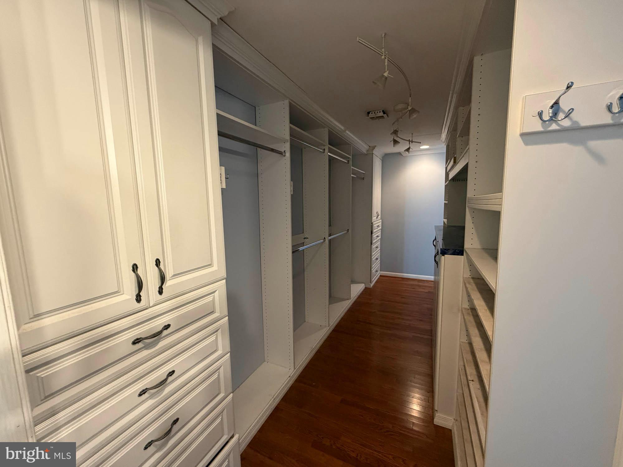 1129 Thompson Avenue Severn, MD 21144 - Photo 19 of 34 a view of a hallway with wooden floor and staircase