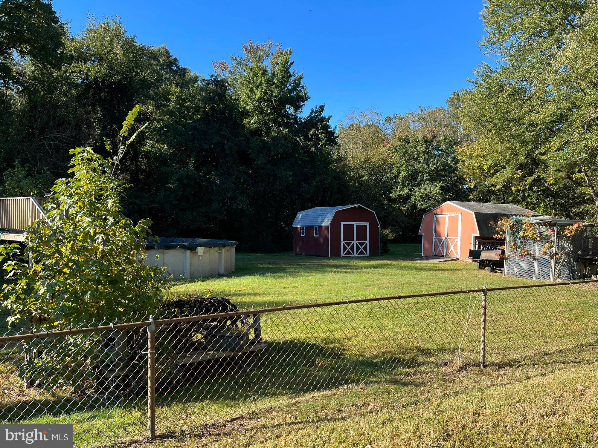 1129 Thompson Avenue Severn, MD 21144 - Photo 6 of 34 a front view of a house with garden