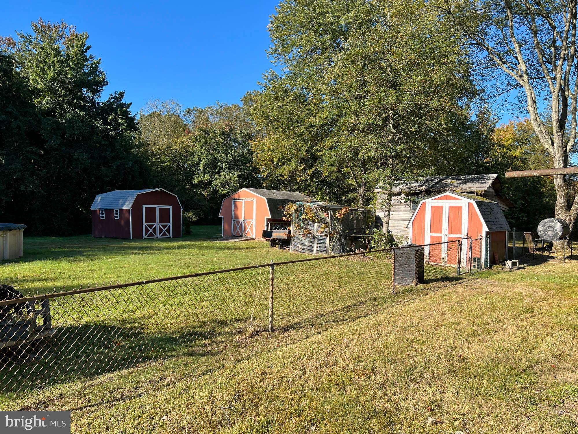1129 Thompson Avenue Severn, MD 21144 - Photo 8 of 34 a front view of a house with a yard