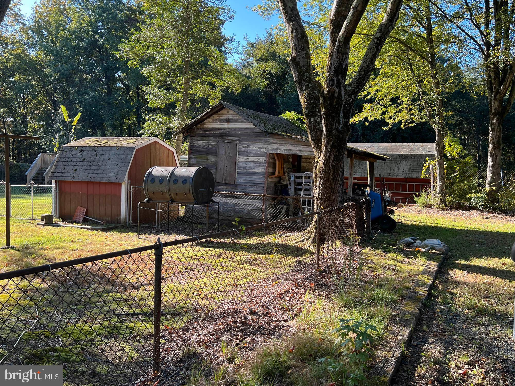 1129 Thompson Avenue Severn, MD 21144 - Photo 9 of 34 a front view of a house with a yard