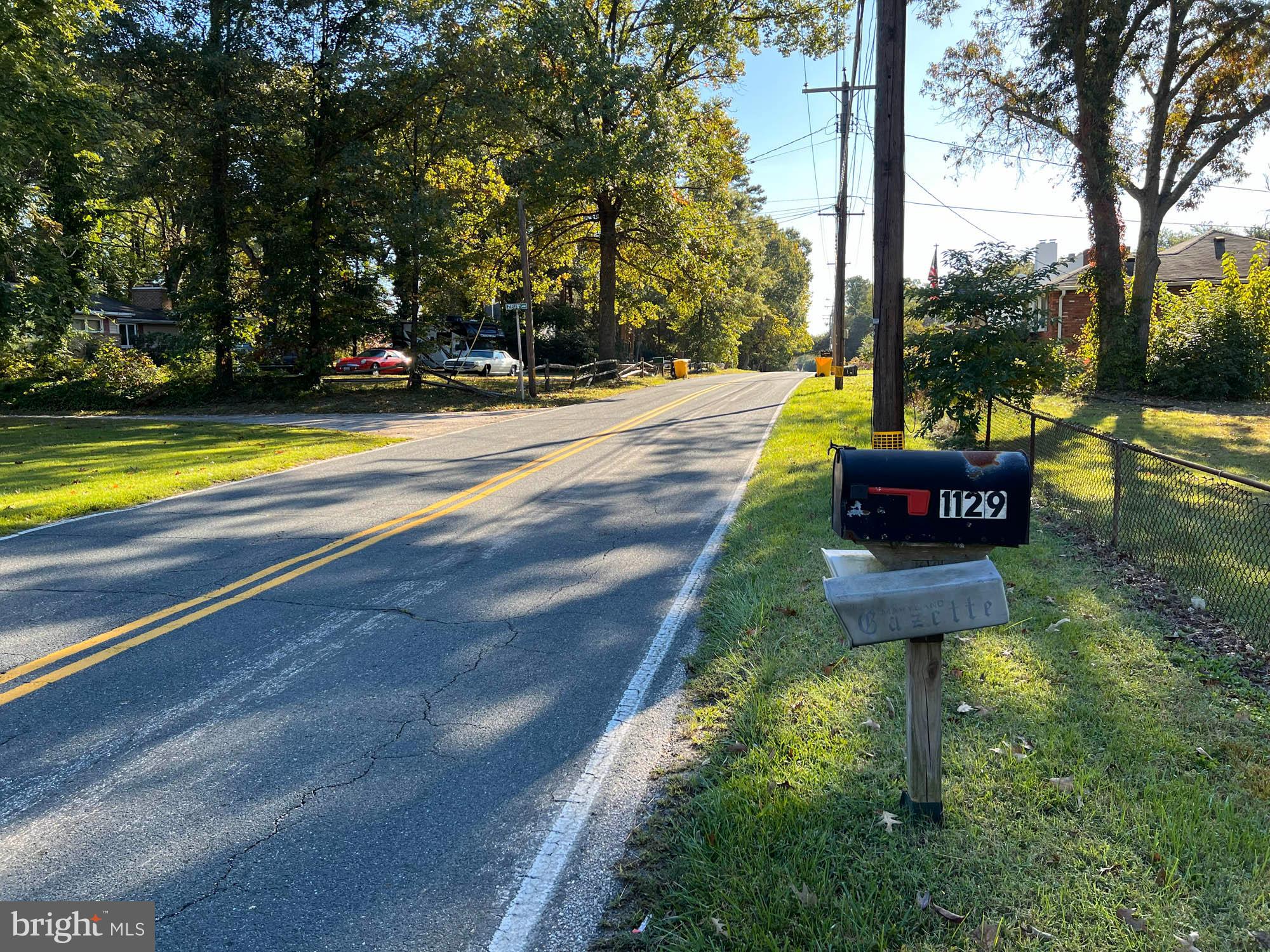 1129 Thompson Avenue Severn, MD 21144 - Photo 10 of 34 a view of swimming pool with a yard