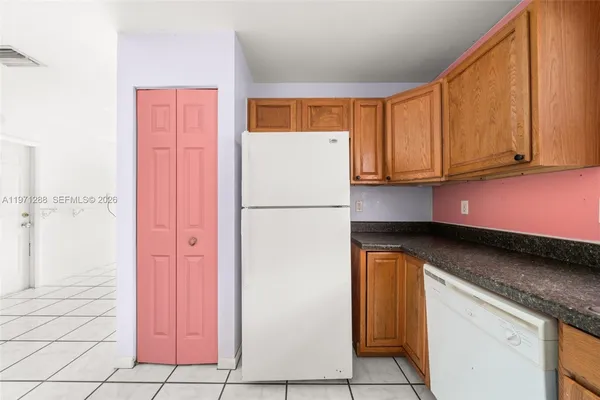 a view of a room with cabinets