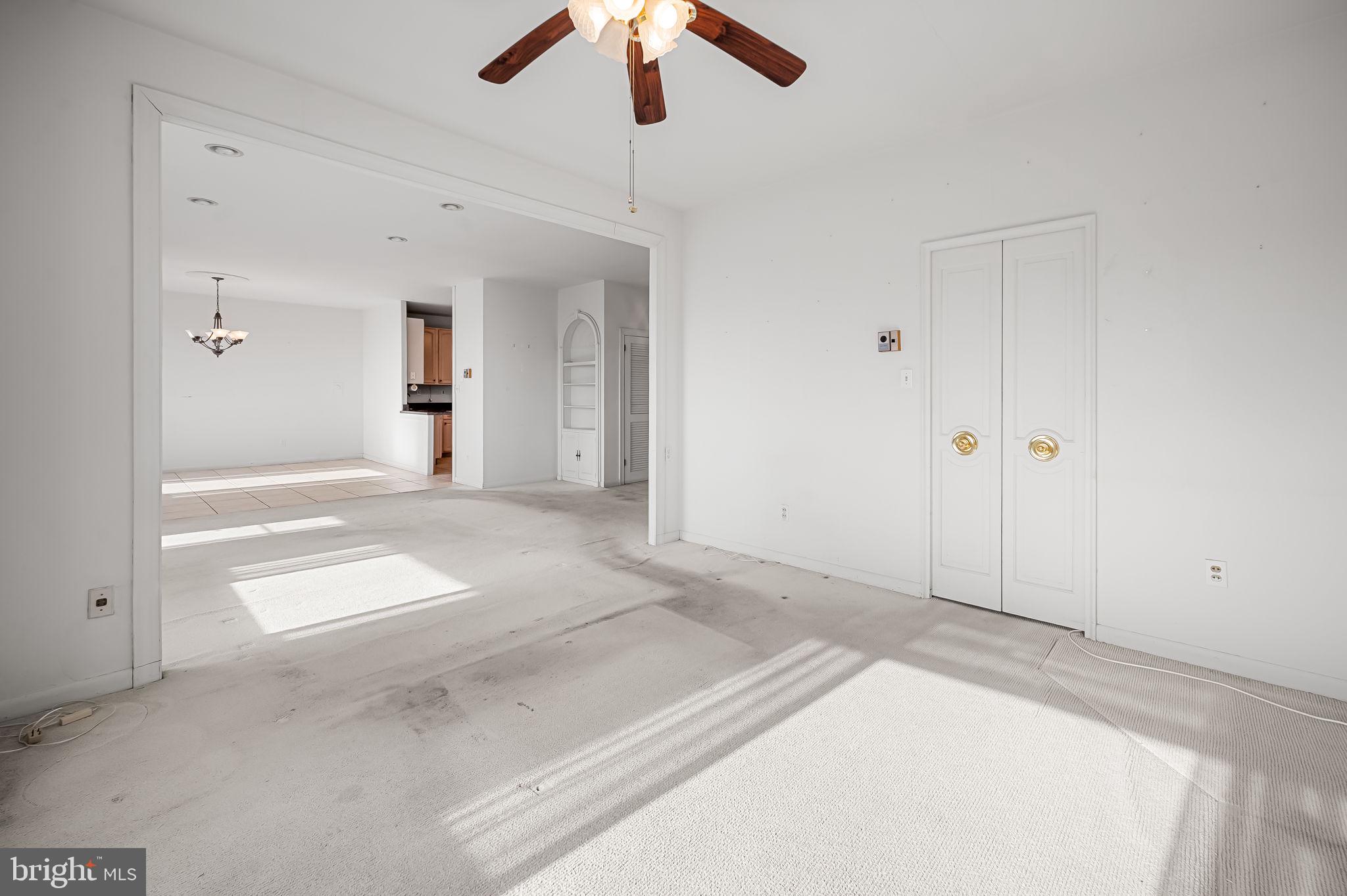 11 Slade Avenue, Unit 911 Pikesville, MD 21208 - Photo 12 of 35 Open concept, view from den