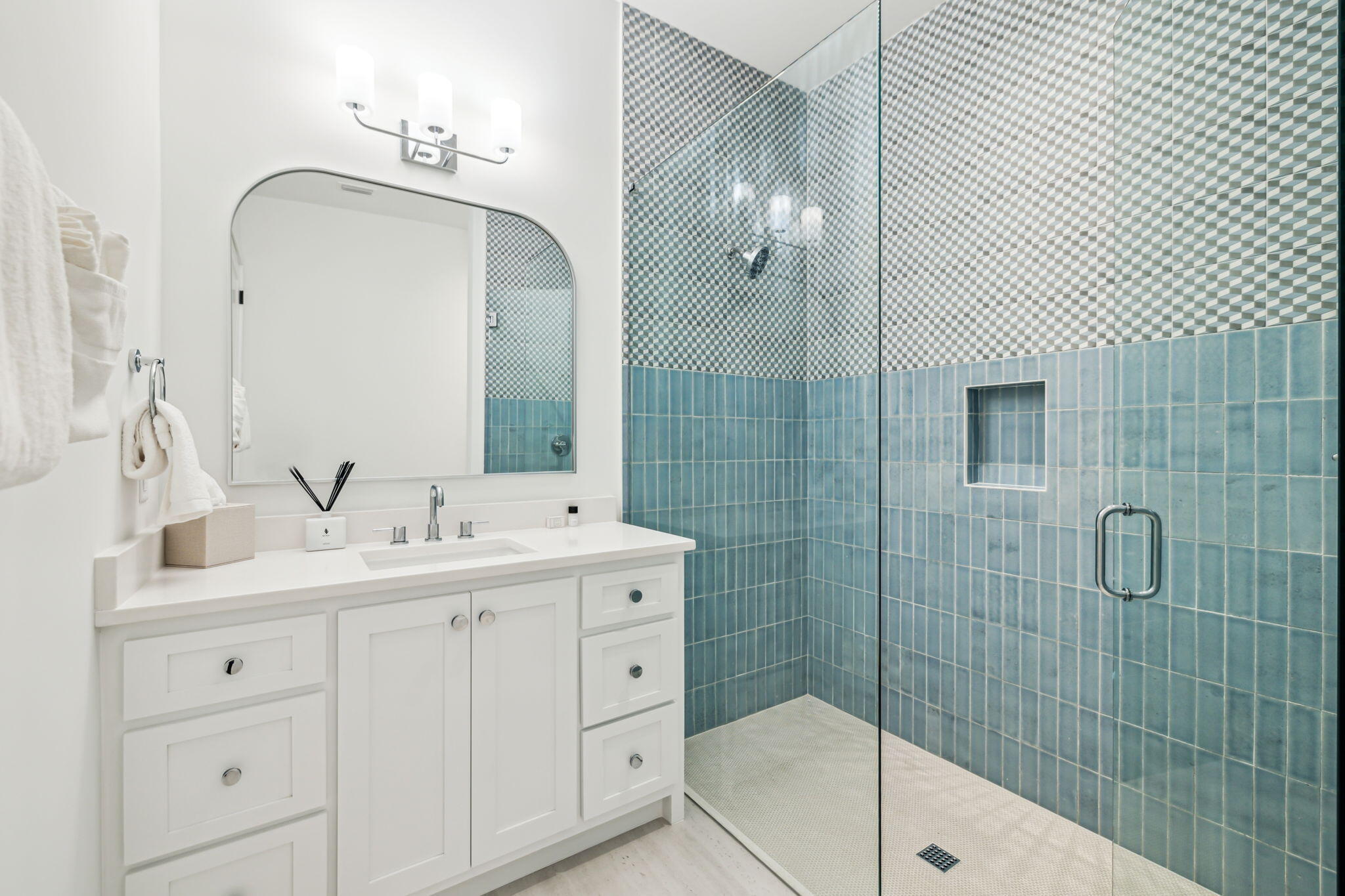 4658 Destiny Way Destin, FL 32541 - Photo 17 of 29 a bathroom with a double vanity sink mirror and shower