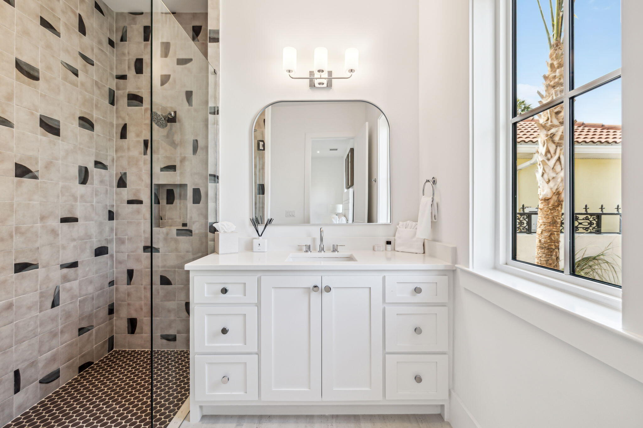 4658 Destiny Way Destin, FL 32541 - Photo 19 of 29 a spacious bathroom with double vanity and a mirror