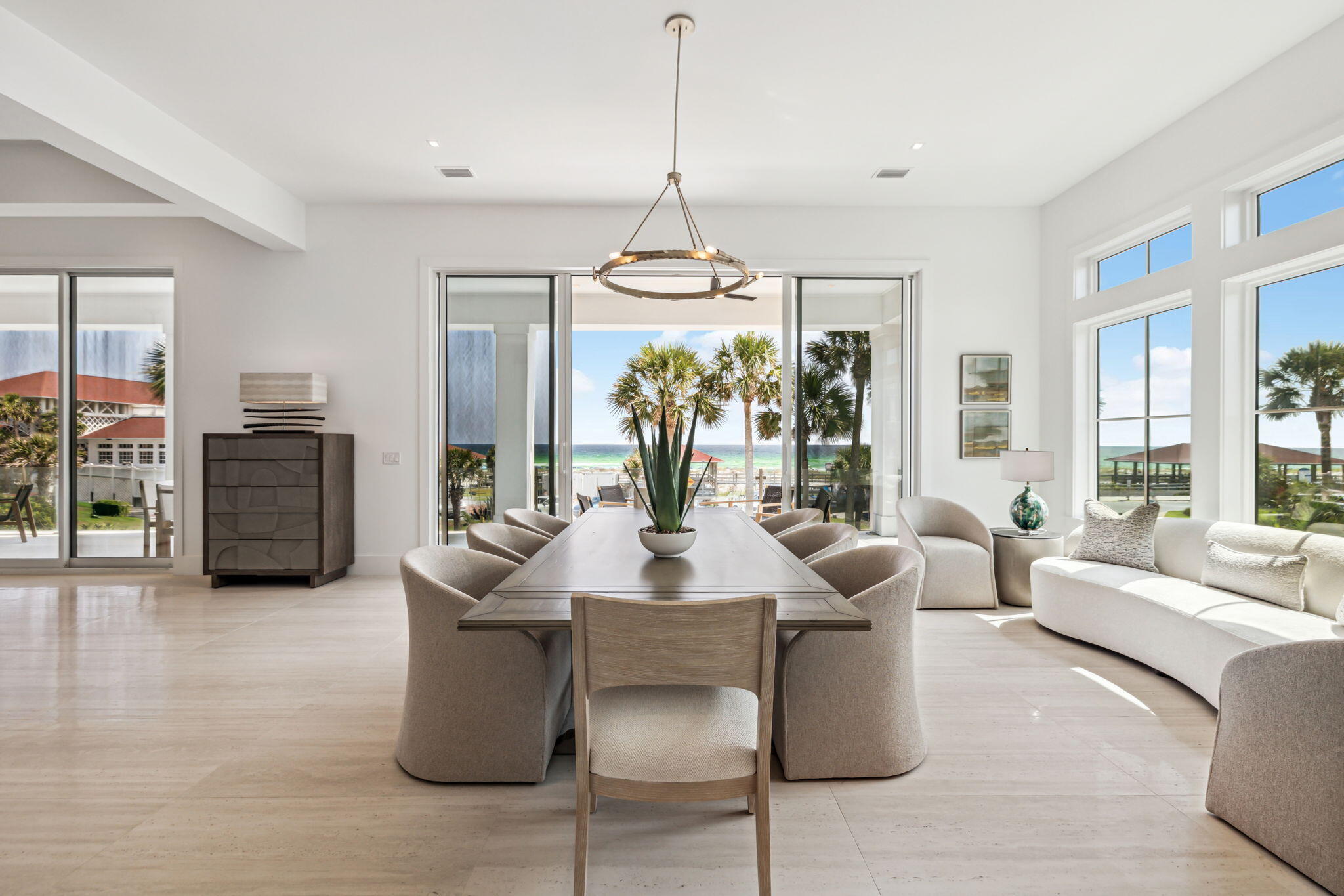 4658 Destiny Way Destin, FL 32541 - Photo 21 of 29 a living room with furniture a chandelier and a chandelier
