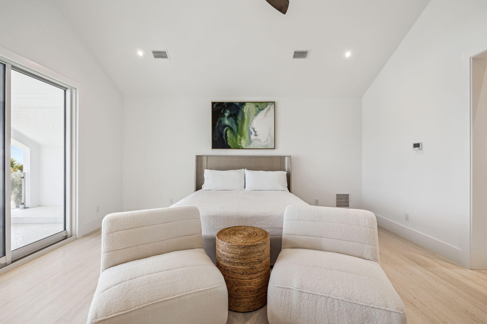 4658 Destiny Way Destin, FL 32541 - Photo 28 of 29 a bedroom with a bed and a painting on the wall