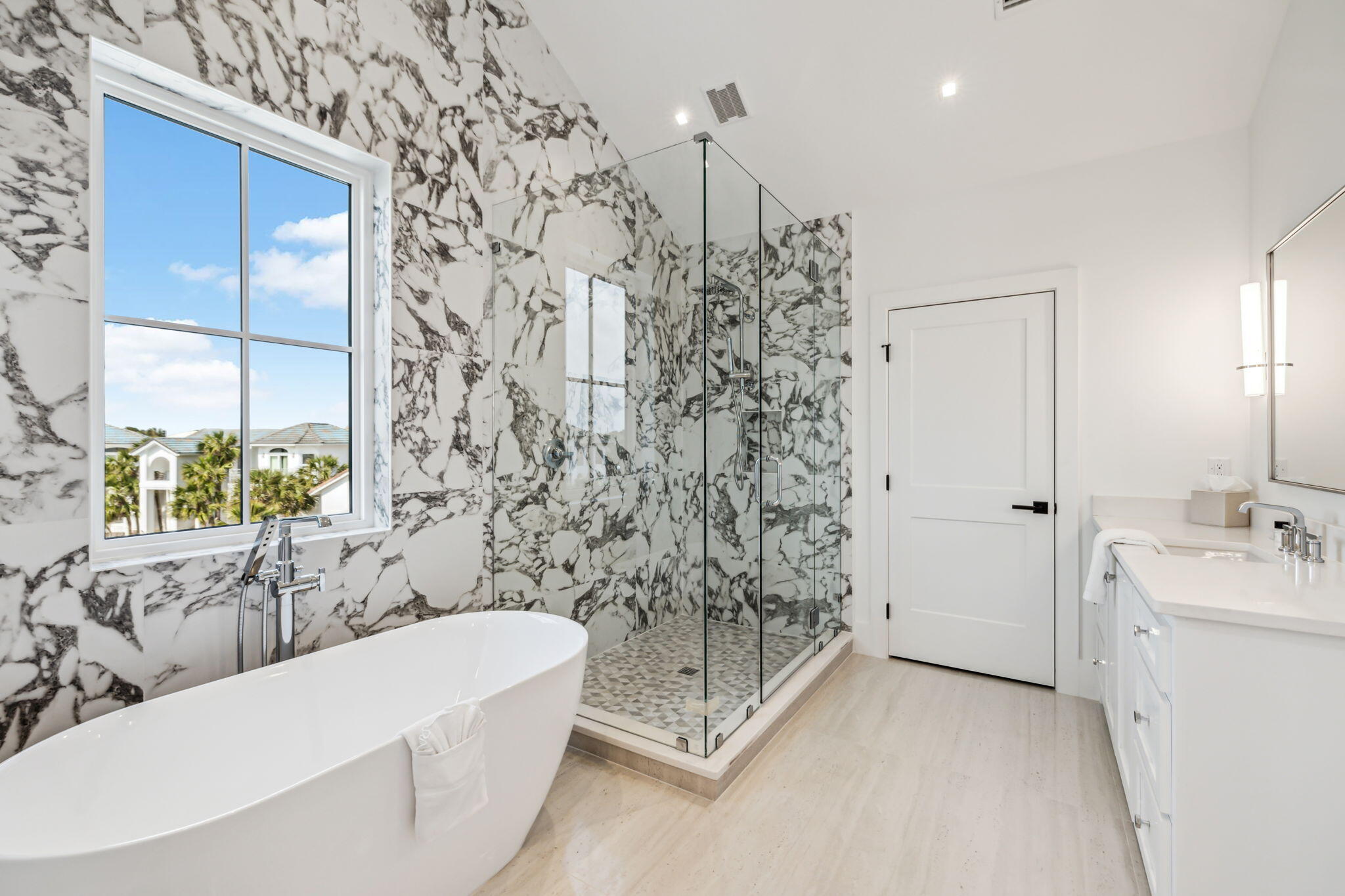 4658 Destiny Way Destin, FL 32541 - Photo 29 of 29 a bathroom with a bathtub and shower