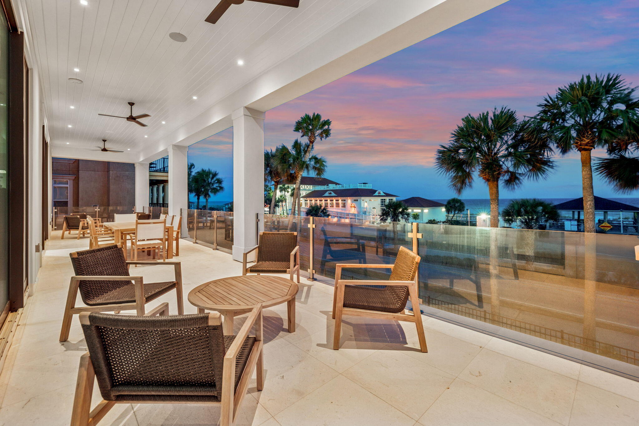 4658 Destiny Way Destin, FL 32541 - Photo 5 of 29 a dinning area with furniture and a potted plant