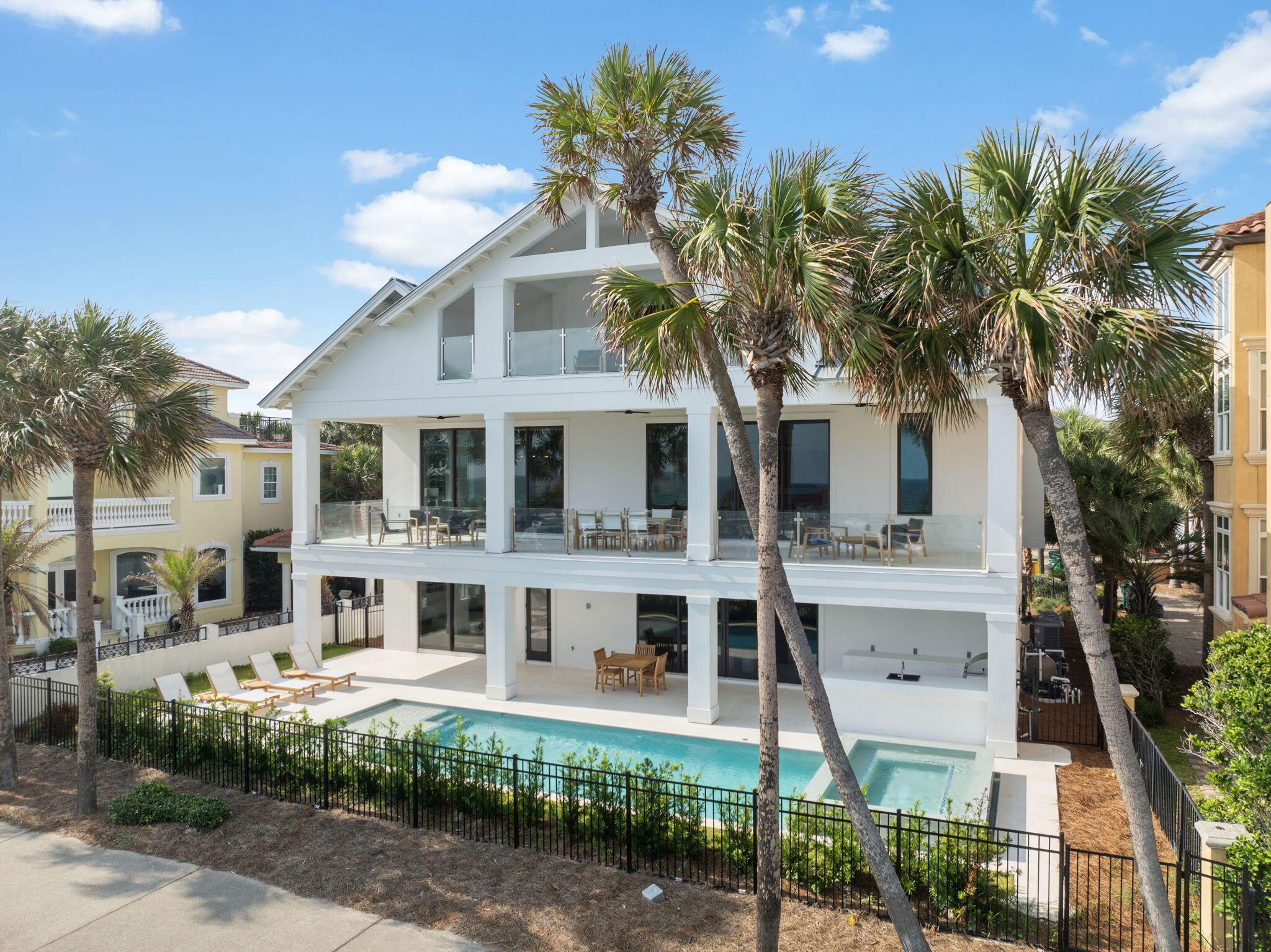 4658 Destiny Way Destin, FL 32541 - Photo 8 of 29 a front view of a house with a garden