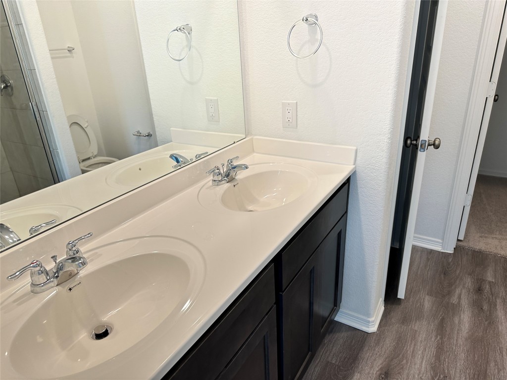16662 Moss Lane Porter, TX 77365 - Photo 4 of 12 a bathroom with a sink and a mirror
