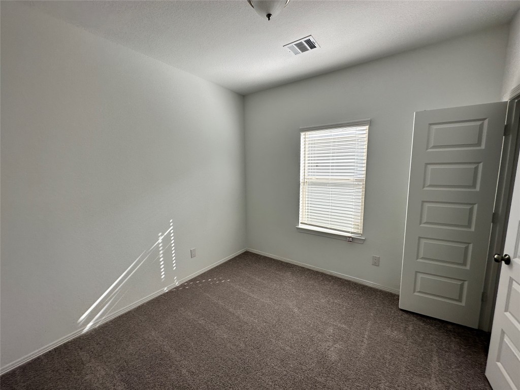 16662 Moss Lane Porter, TX 77365 - Photo 10 of 12 a view of an empty room and a window