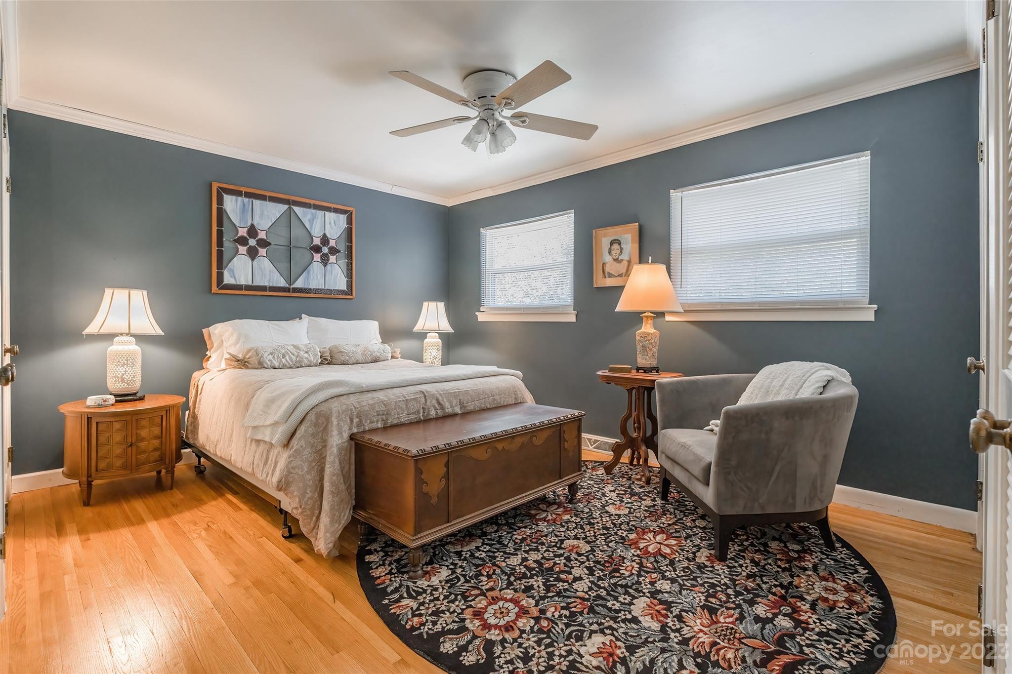 6916 Thermal Road Charlotte, NC 28211 - Photo 14 of 47 a bedroom with a bed and wooden floor