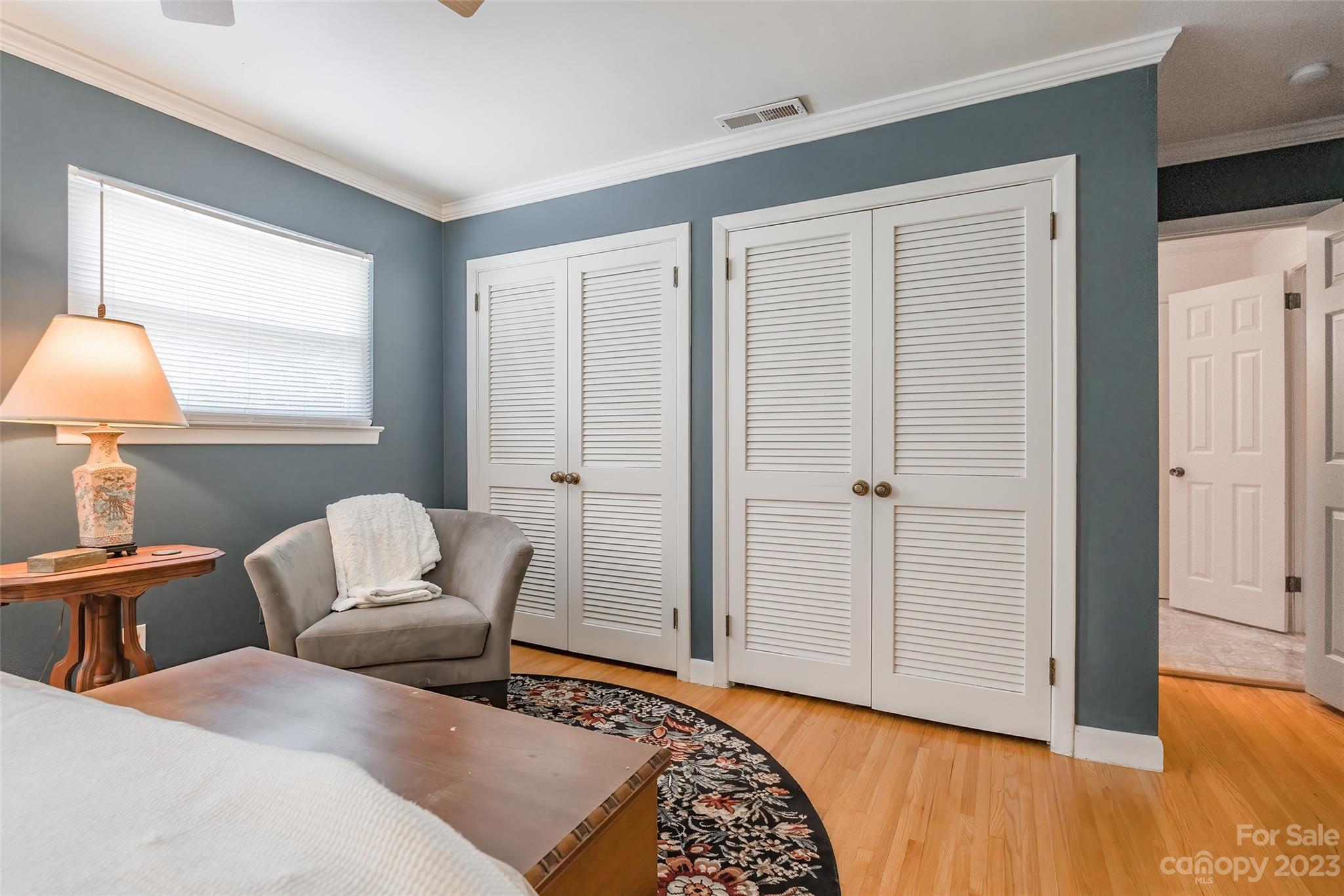 6916 Thermal Road Charlotte, NC 28211 - Photo 15 of 47 a bedroom with furniture and a window