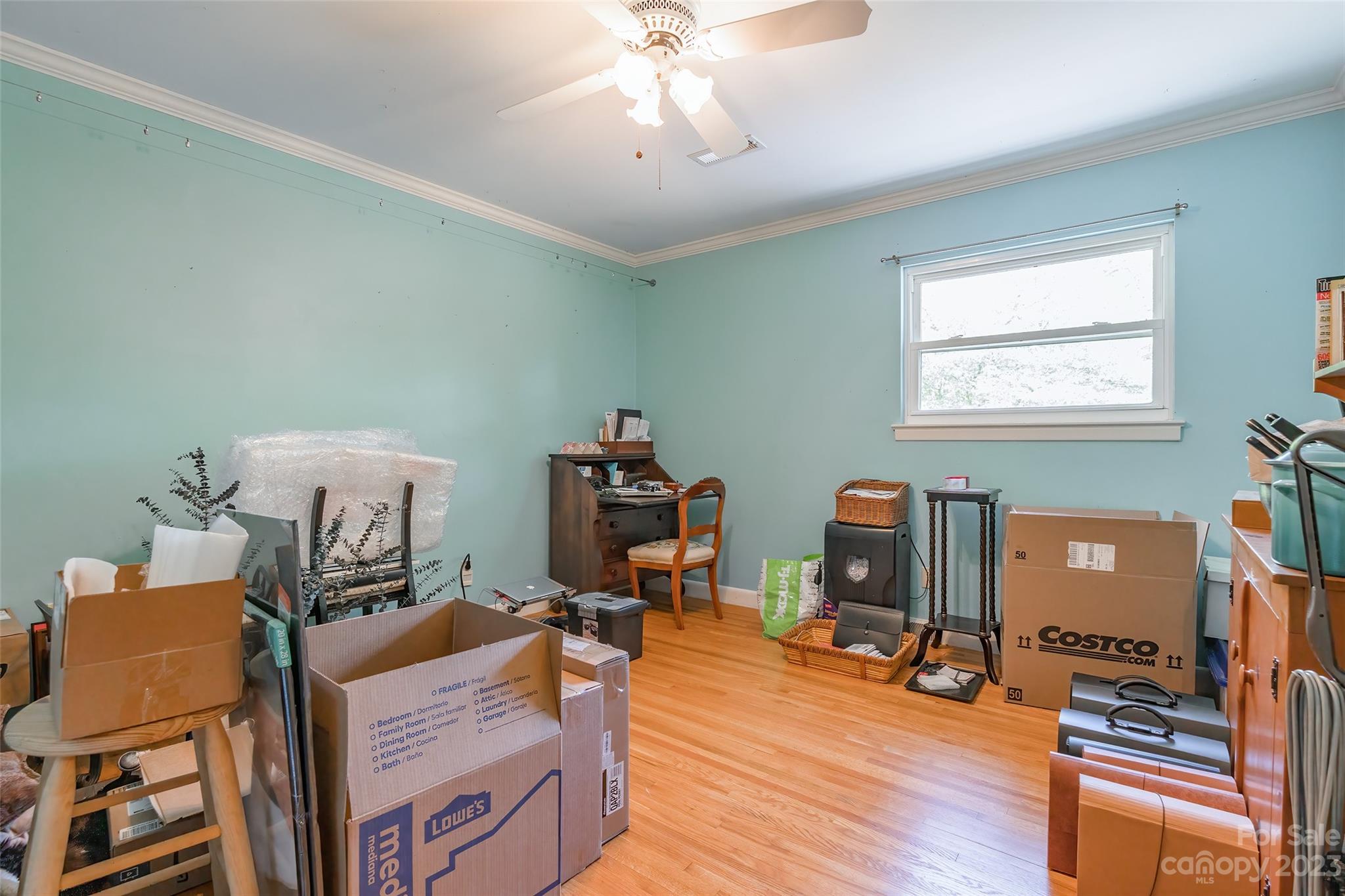 6916 Thermal Road Charlotte, NC 28211 - Photo 25 of 47 a bedroom with furniture and a wooden floor