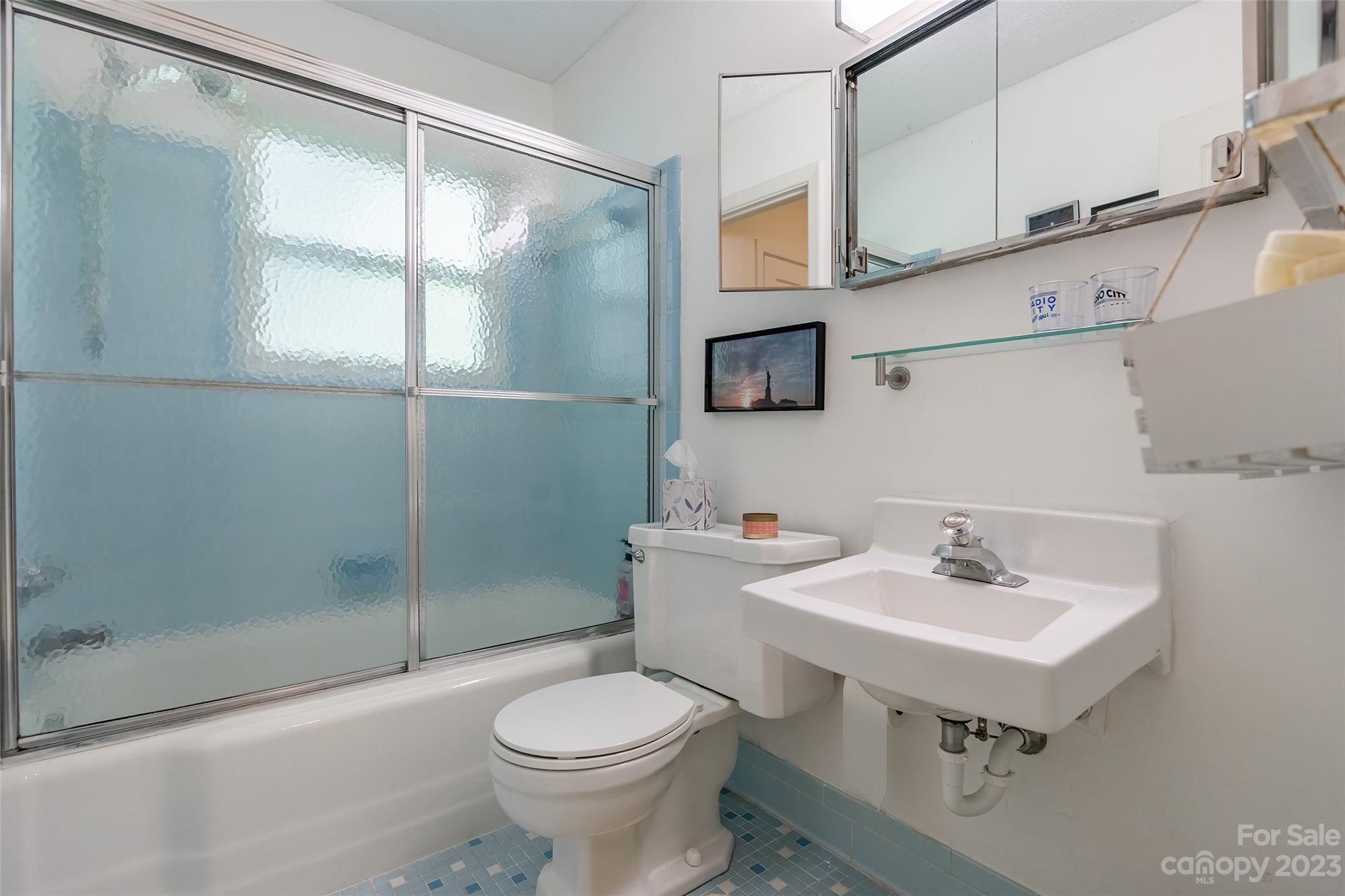 6916 Thermal Road Charlotte, NC 28211 - Photo 27 of 47 a bathroom with a sink toilet and shower